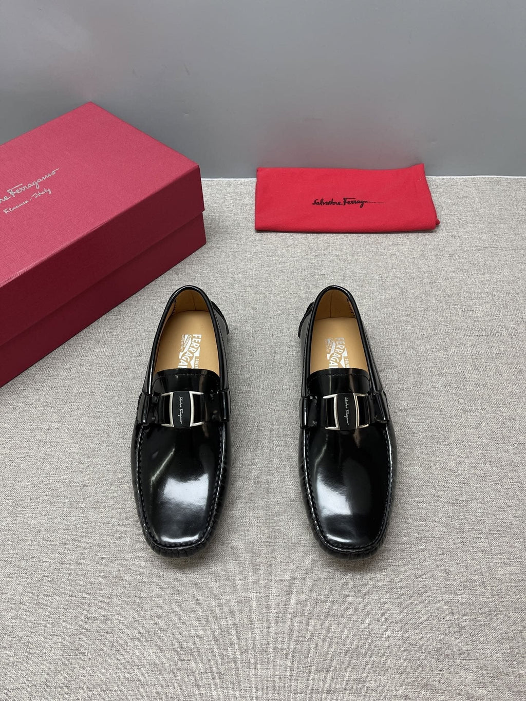Ferragamo Black Buckle Driving Loafers — hero