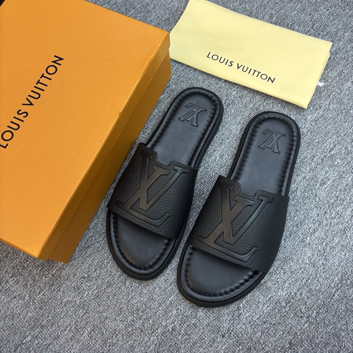 Black Embossed Slide Sandals — front