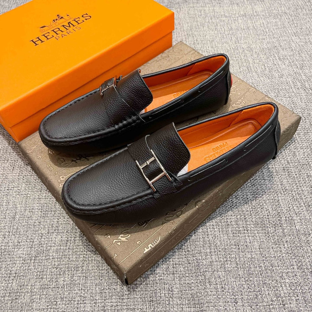 Hermès Black Bar Loafers — side