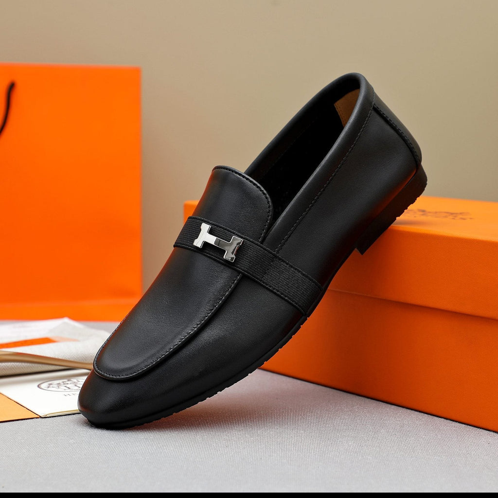 Hermès Black H-Hardware Slip-On Loafers — side