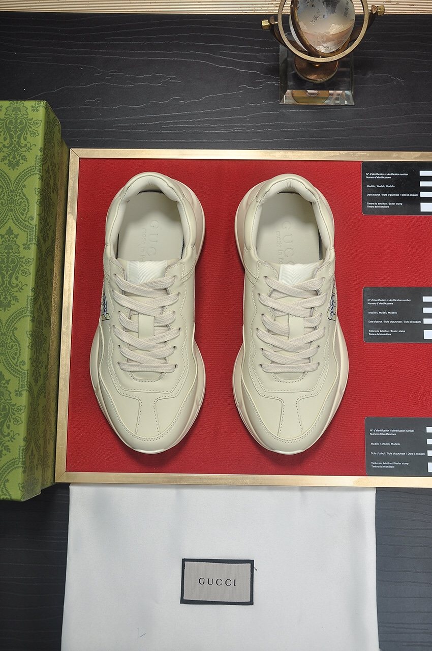 Gucci Off-White Graphic Sneakers — hero