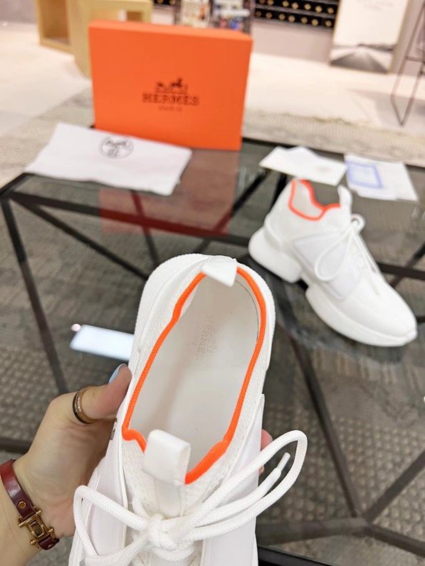 Hermès White Orange Knit Sneakers — detail