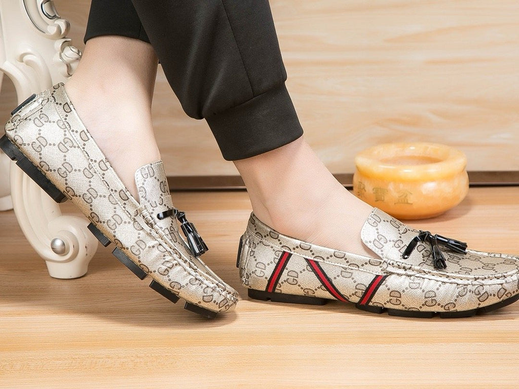 Gucci Monogram Stripe Tassel Loafers — model