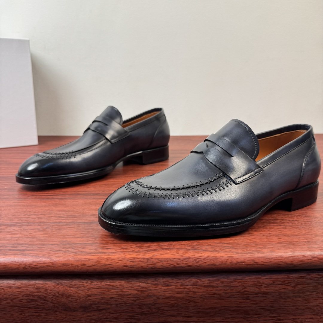 Berluti Burnished Penny Loafers — model