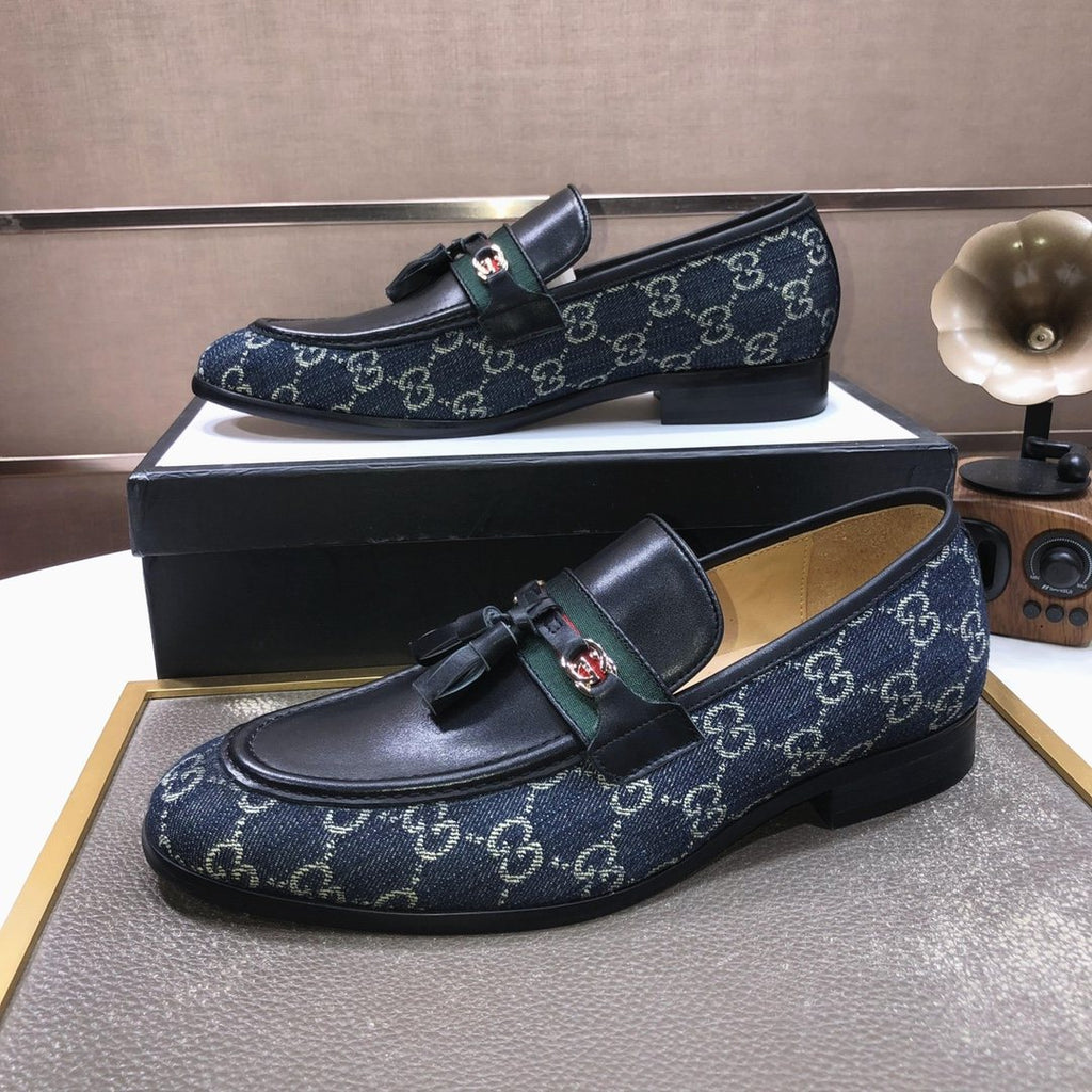 Gucci Monogram Tassel Loafers — side