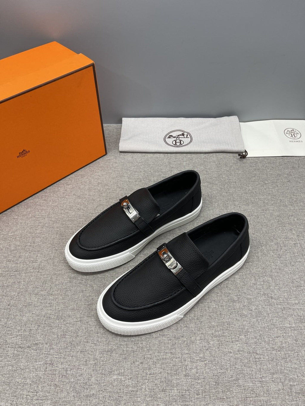Hermès Textured Bar Loafers — front