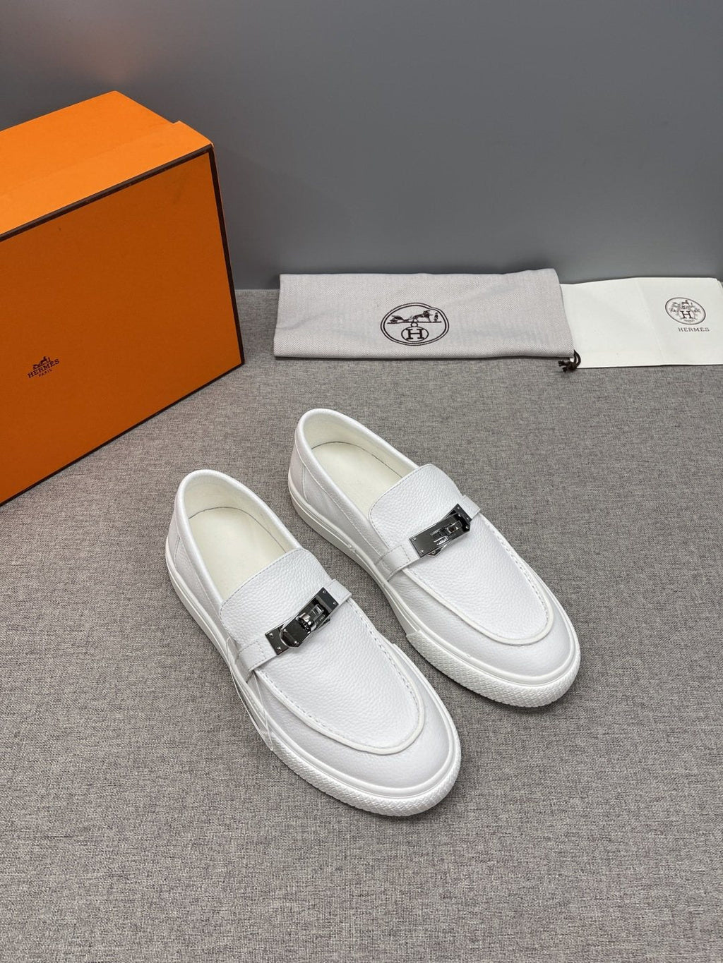 Hermès Textured Bar Loafers — side