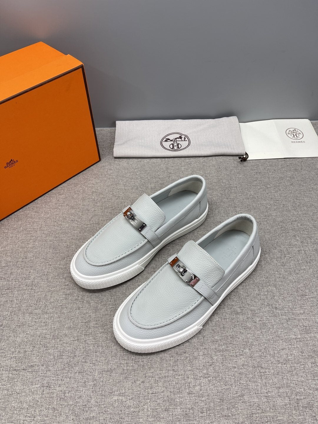 Hermès Textured Bar Loafers — side