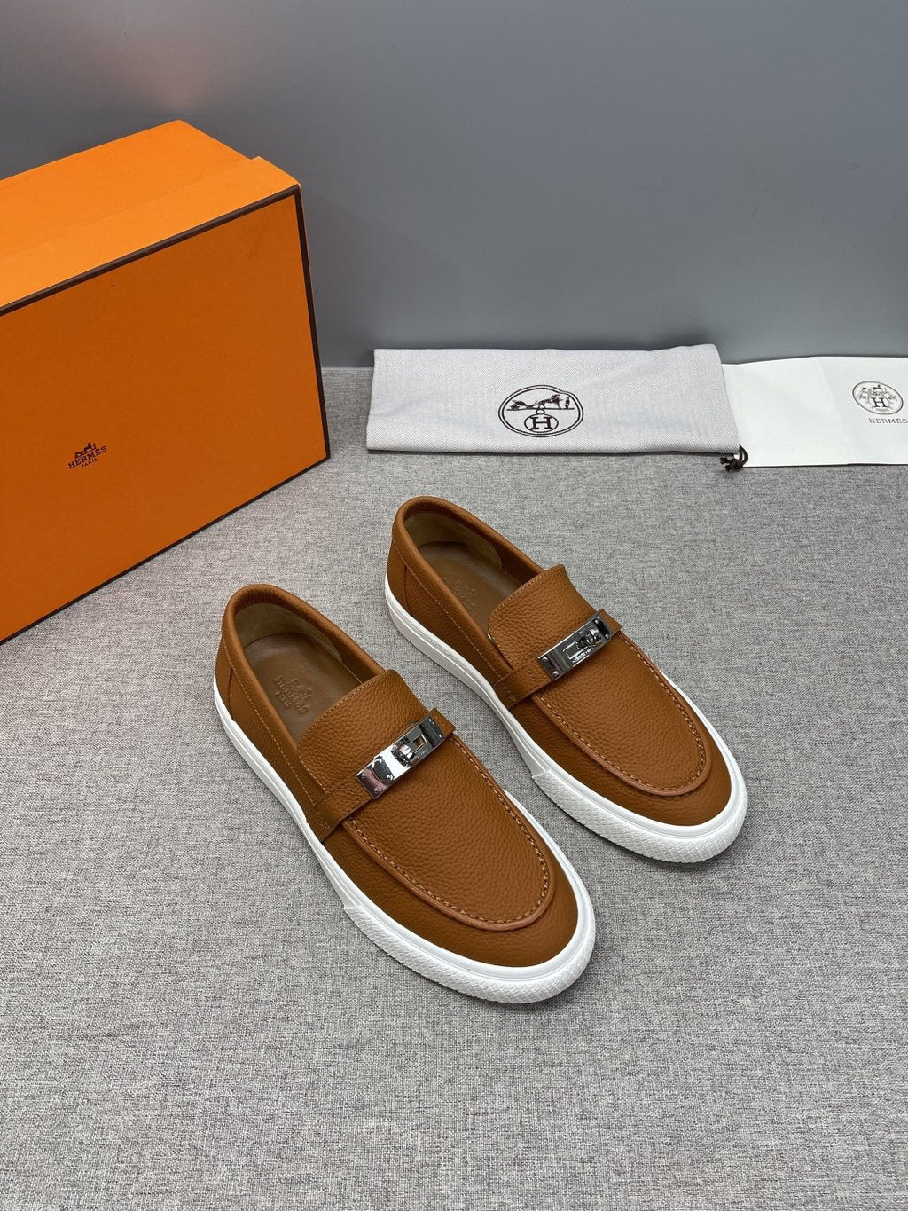 Hermès Textured Bar Loafers — front