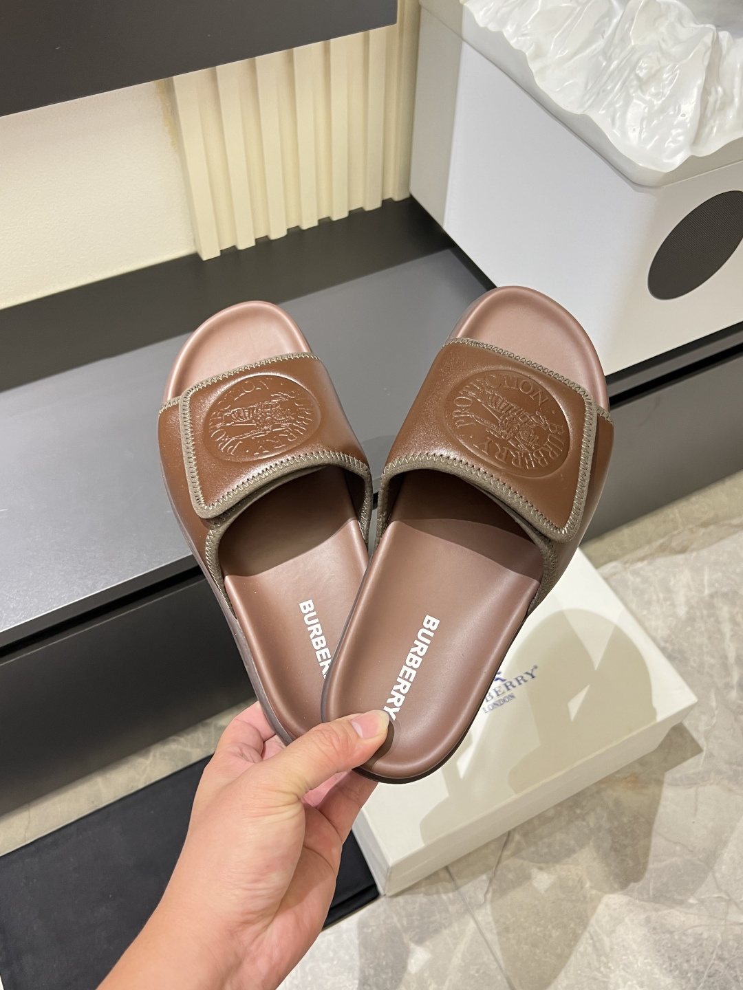 Burberry Embossed Check Slide Sandals — model
