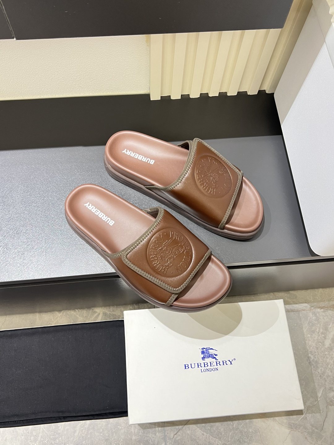 Burberry Embossed Check Slide Sandals — side