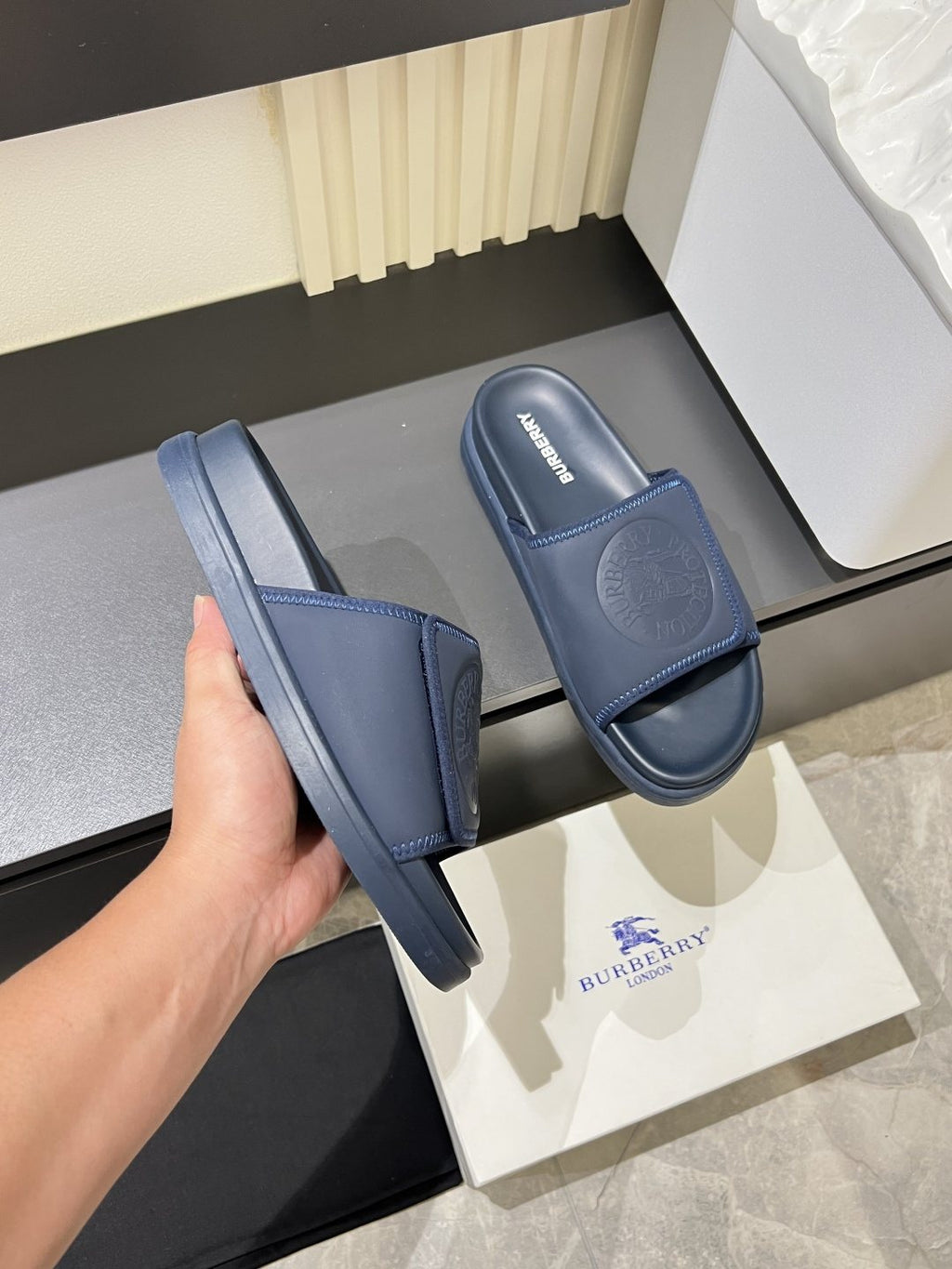 Burberry Embossed Check Slide Sandals — model