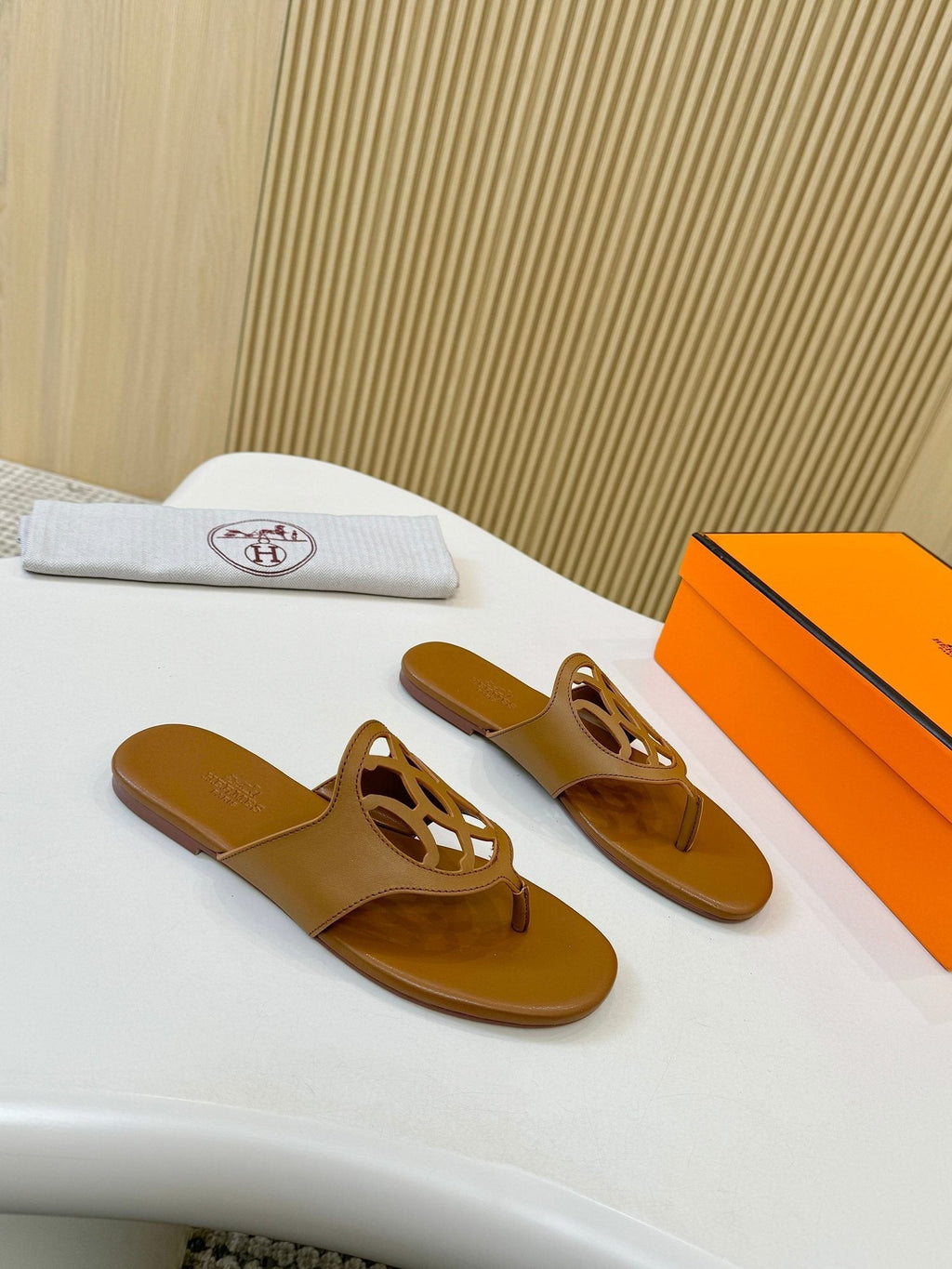 Hermès Tan Brown Cutout Thong Sandals — hero