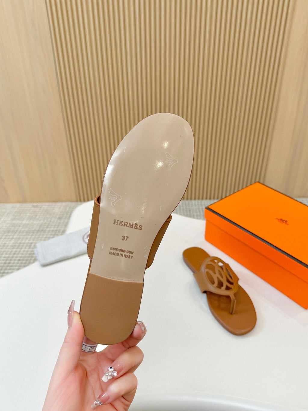 Hermès Tan Brown Cutout Thong Sandals — detail