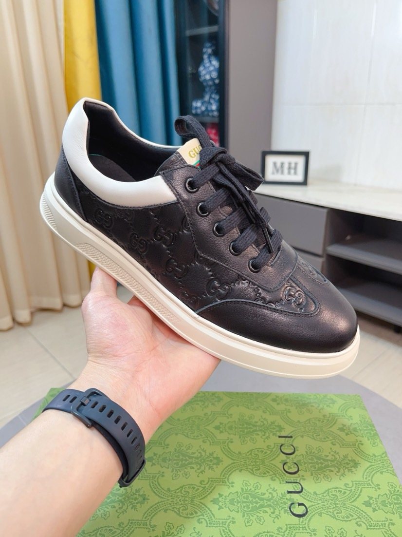 Gucci Embossed Low-Top Sneakers — model