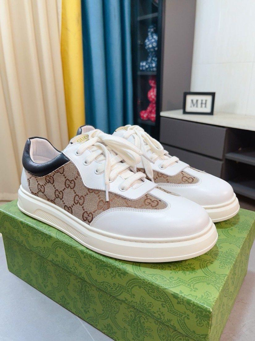 Gucci Embossed Low-Top Sneakers — side