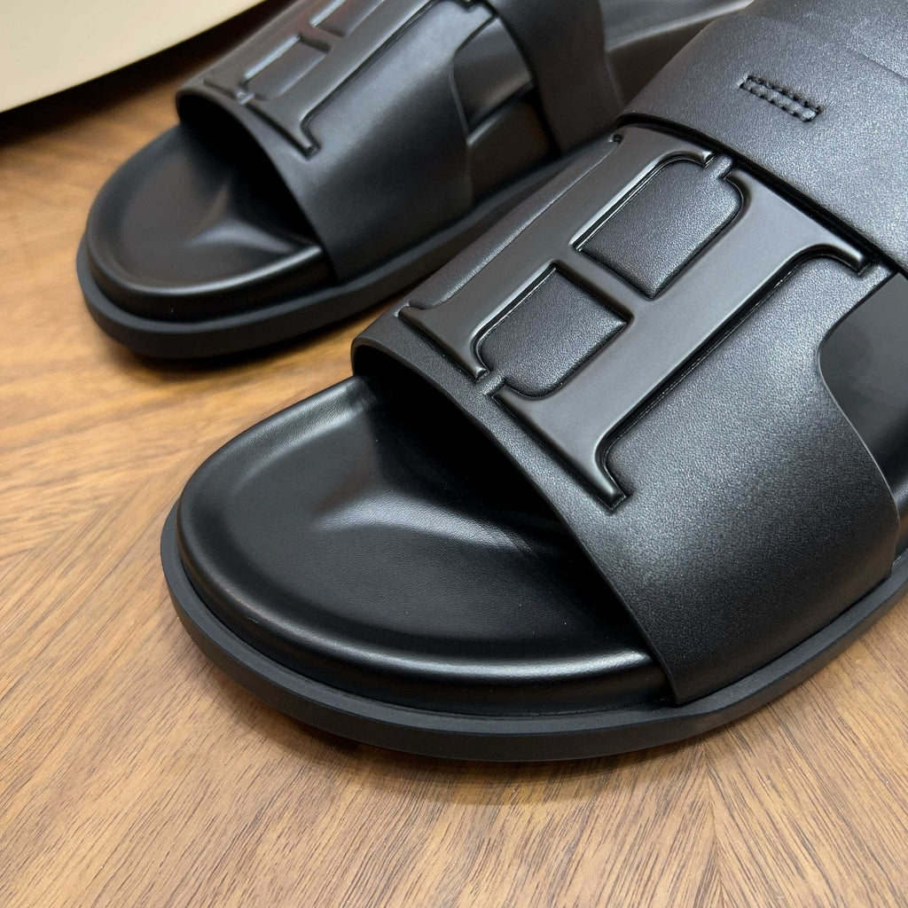 Hermès Men’s H-Embellished Slide Sandals — detail