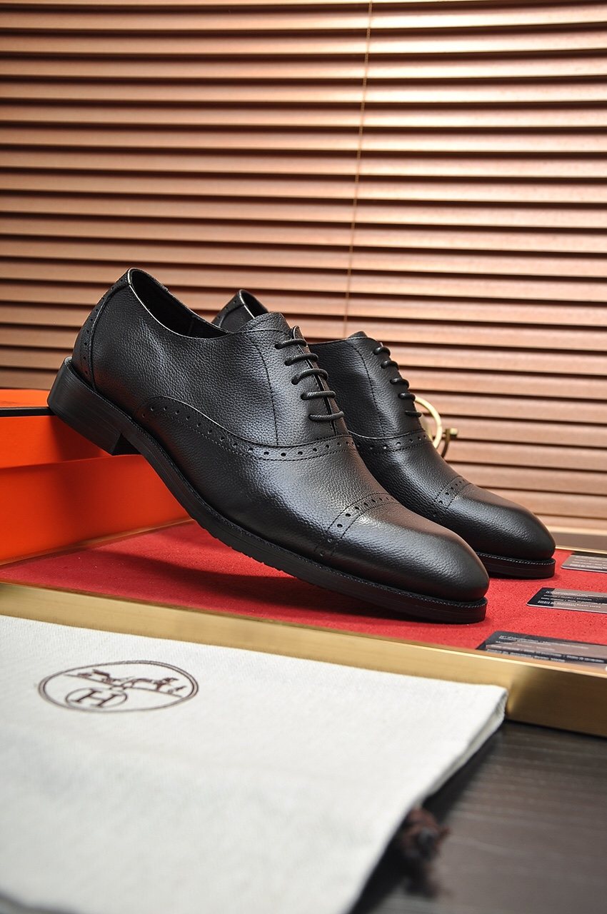 Hermès Perforated Leather Lace-Up Dress Shoes — front
