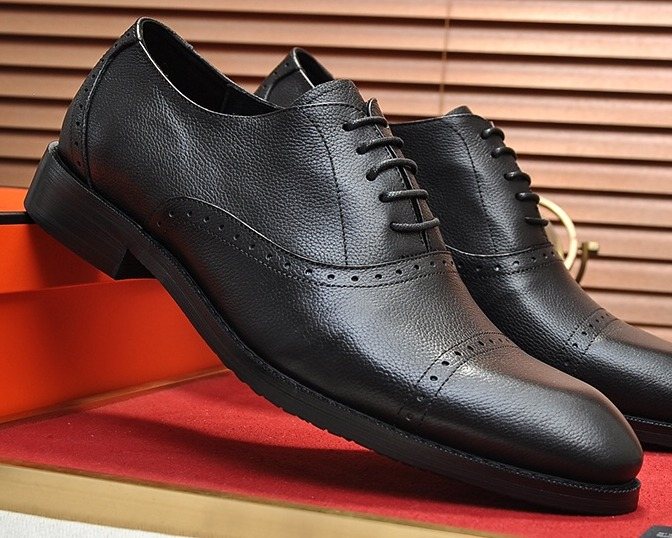 Hermès Perforated Leather Lace-Up Dress Shoes — hero