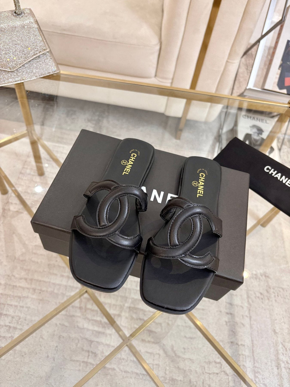 Chanel Embossed Logo Slide Sandals — front