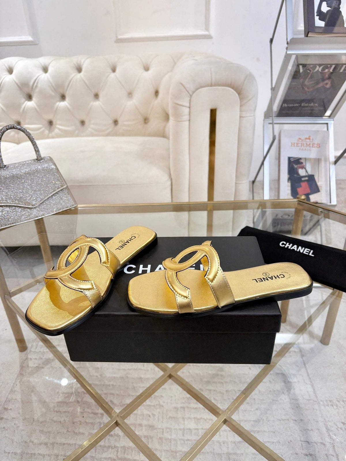 Chanel Embossed Logo Slide Sandals — front