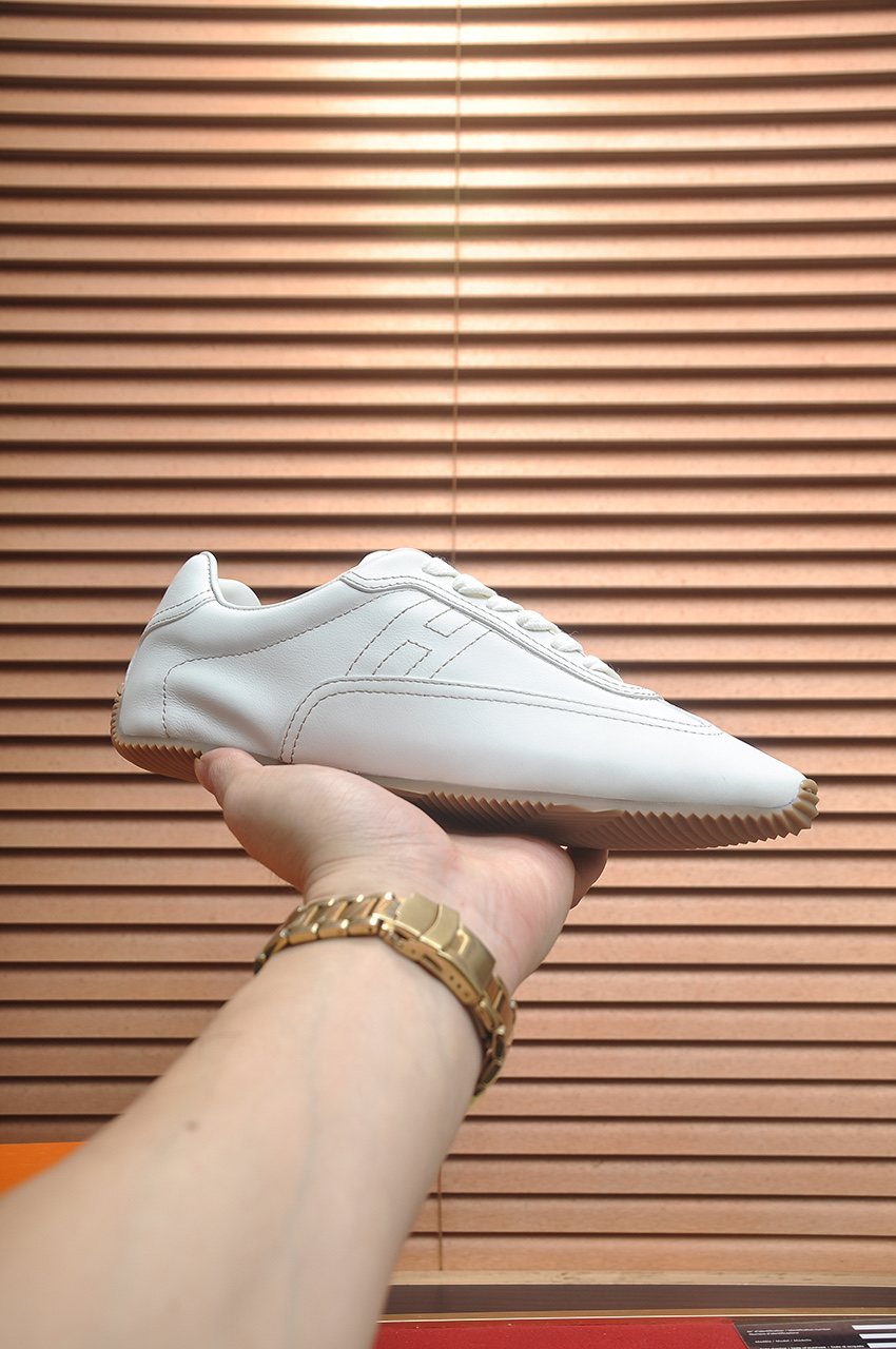 Hermès Low-Top Lace-Up Sneakers — model