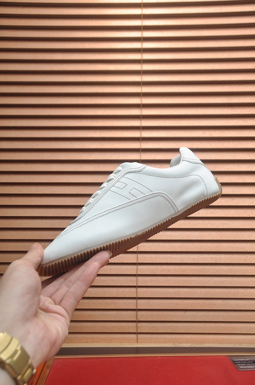 Hermès Low-Top Lace-Up Sneakers — side