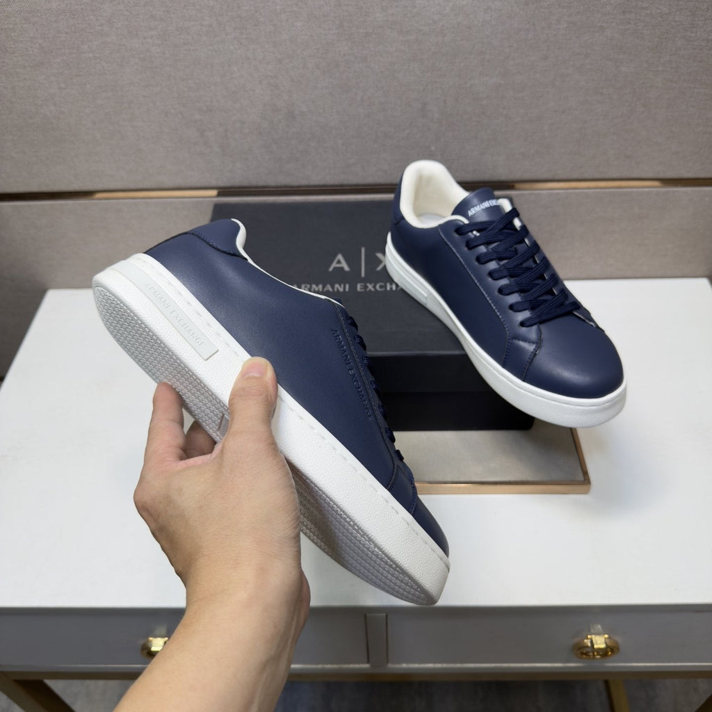 Armani Exchange Contrast Heel Low-Top Sneakers — model