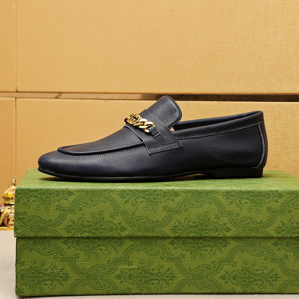 Gucci Pebble Leather Loafers — side