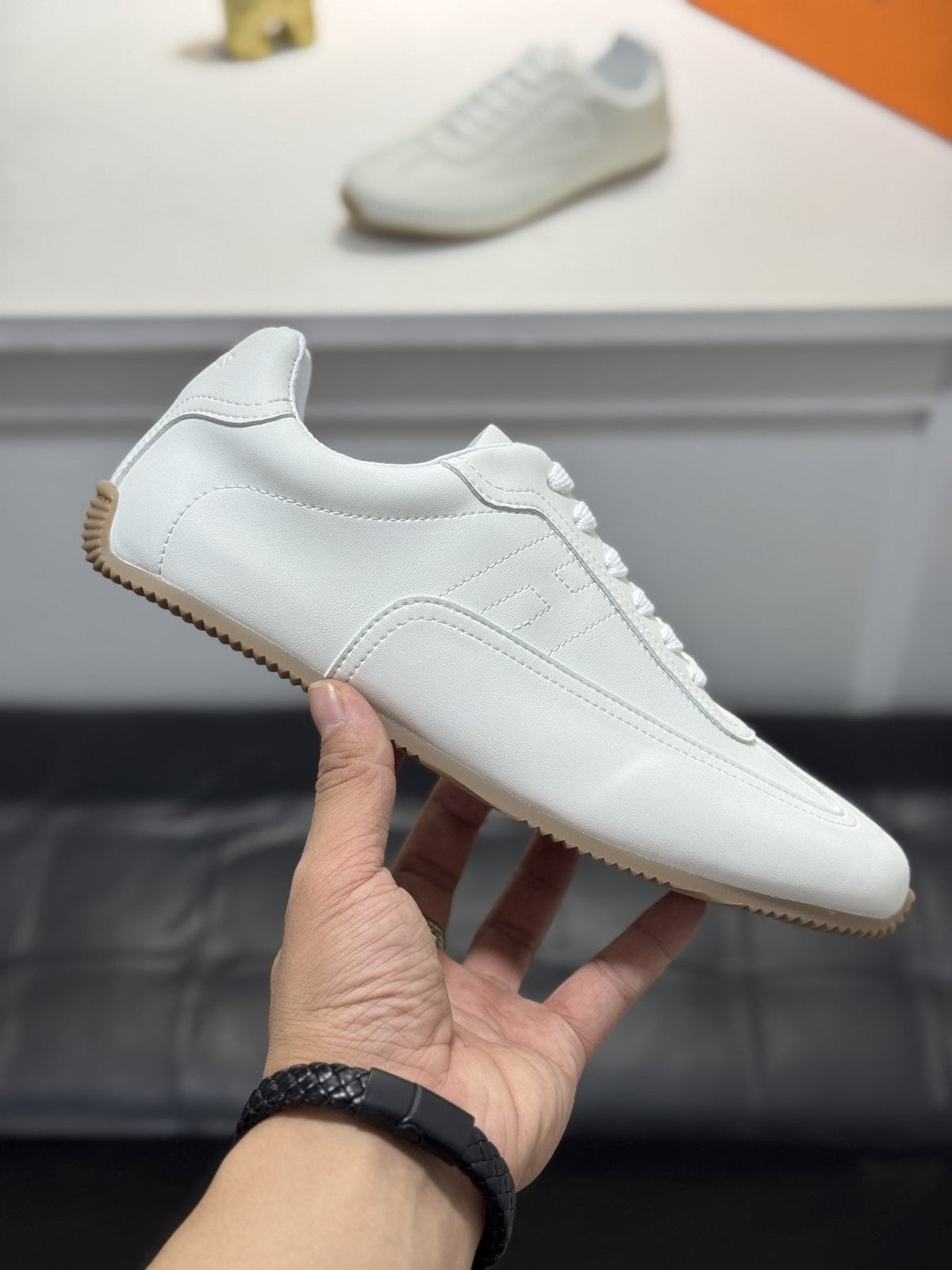 Hermès Contrast-Trim Low-Top Sneakers — side