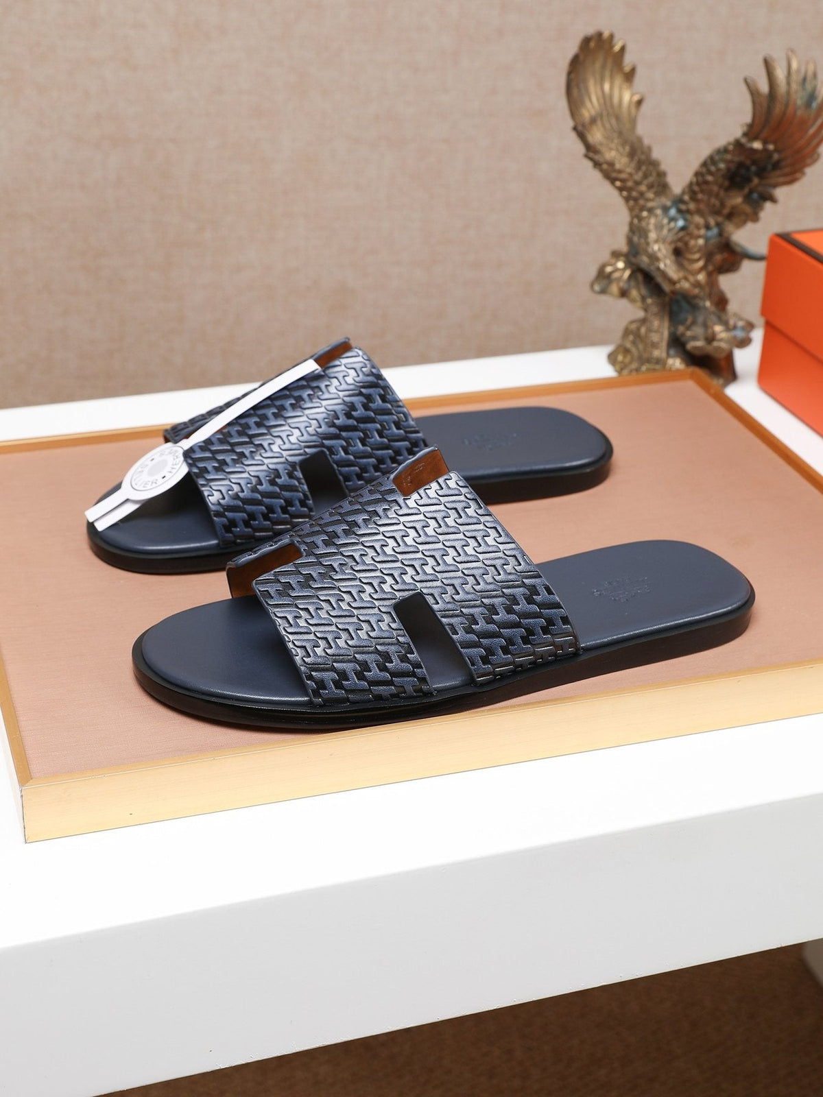 Hermès Textured H Slide Sandals — side