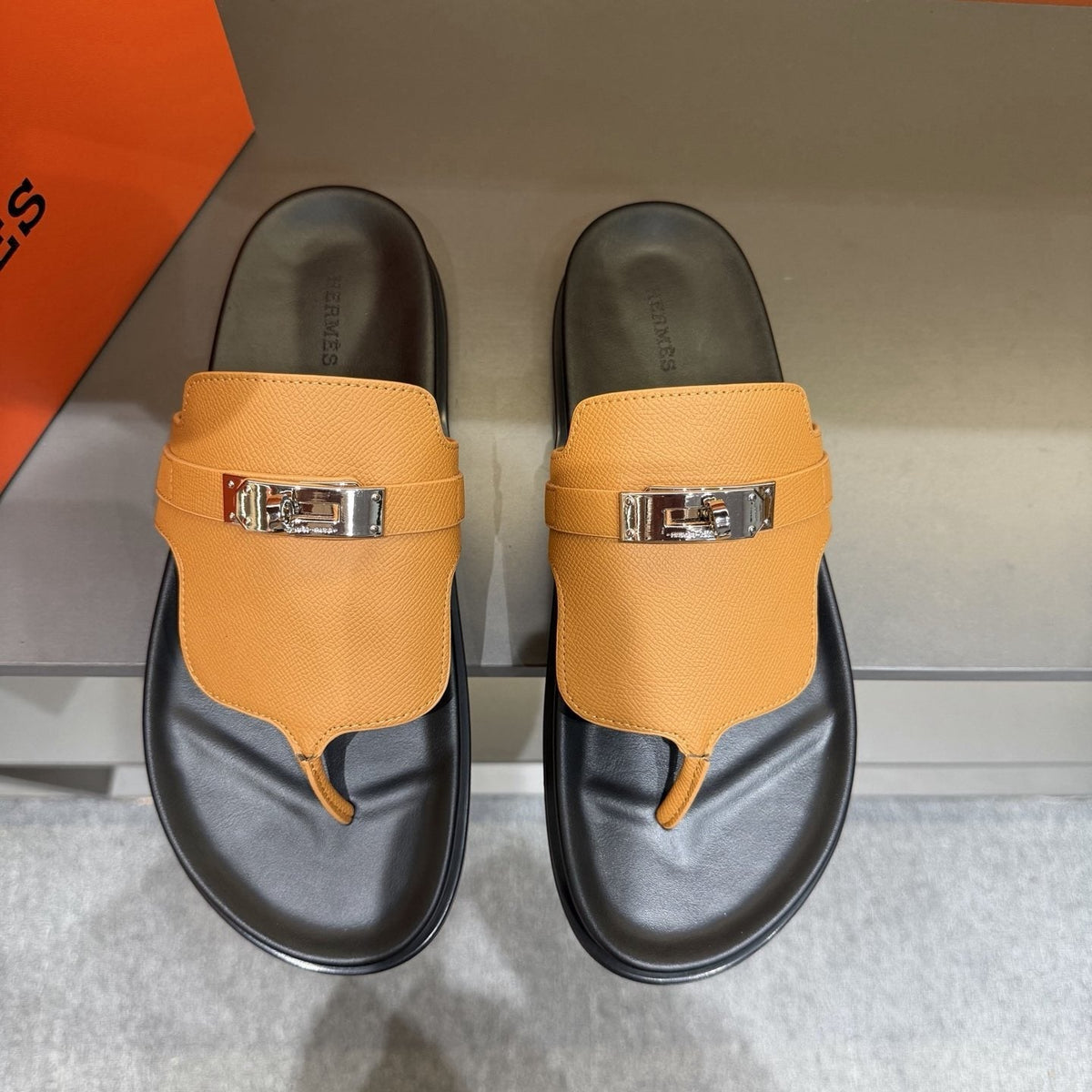 Hermès Metal-Hardware Thong Sandals — front