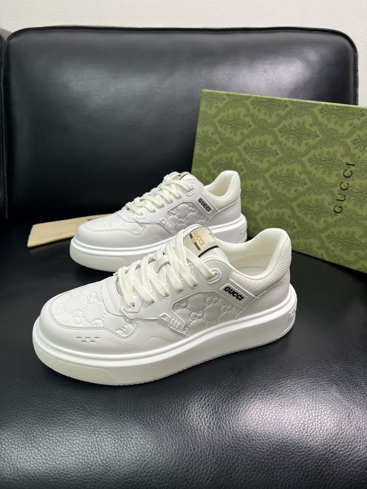 Gucci Embossed Low-Top Sneakers — side