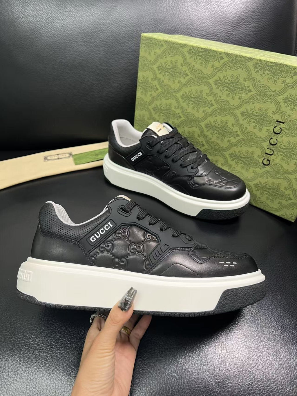 Gucci Embossed Low-Top Sneakers — side