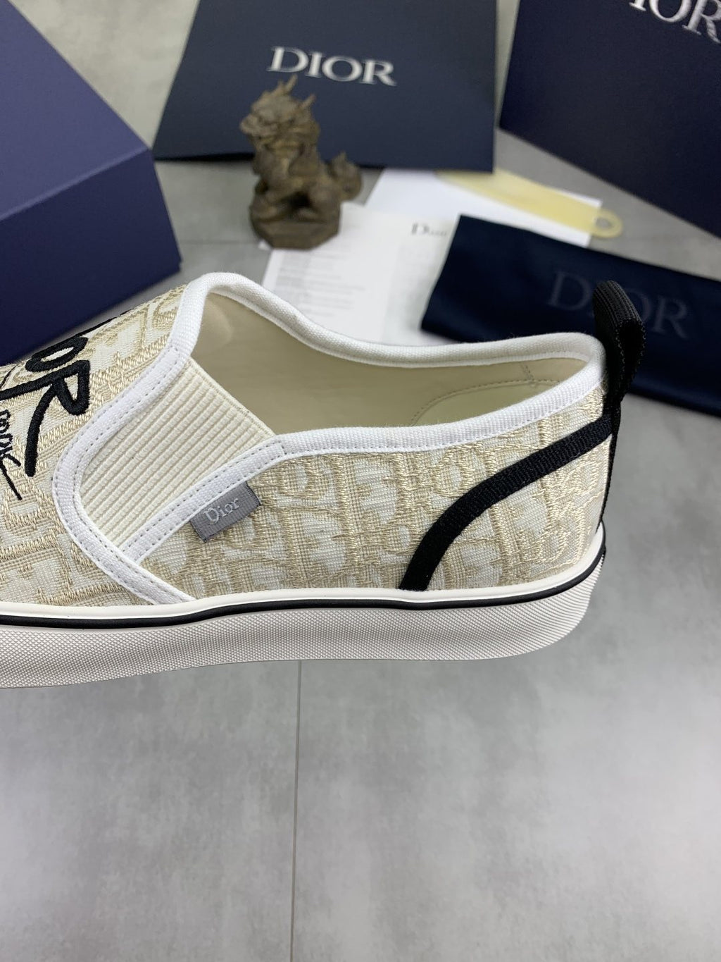Dior Ivory Canvas Slip-On Sneakers — side